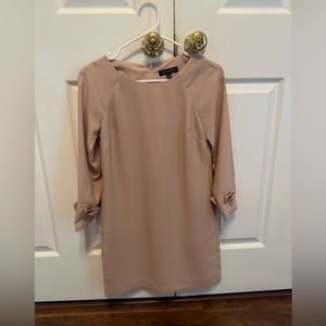 Long sleeved tan shift dress
